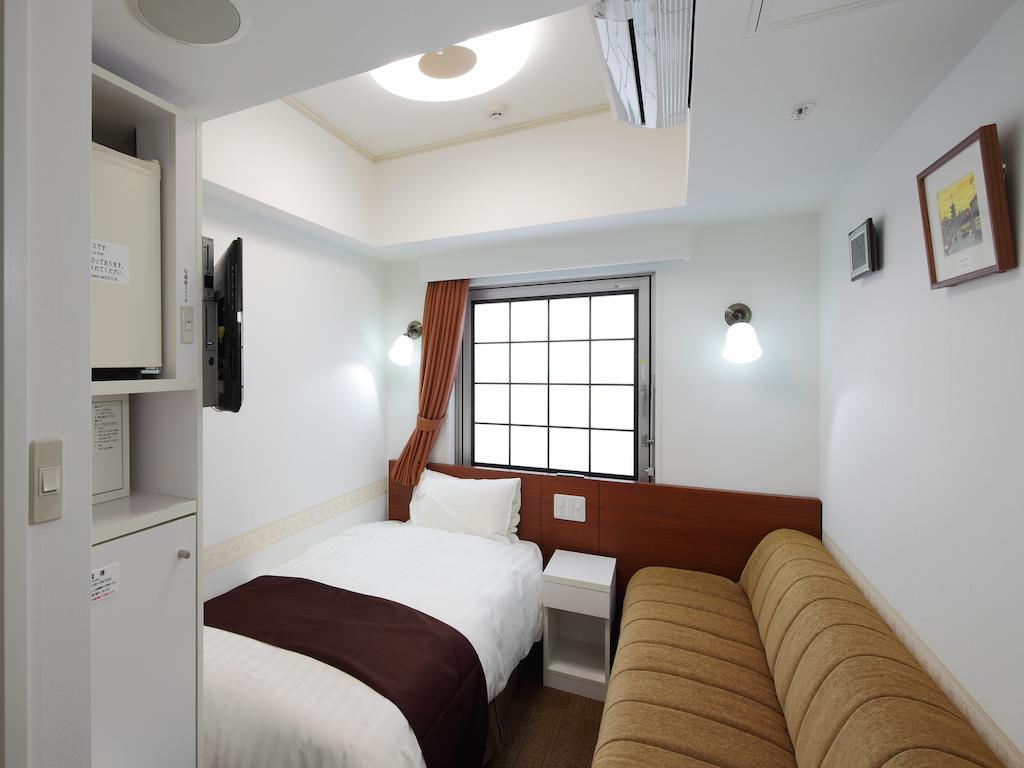 Check In Shijokarasuma Hotell Kyoto Rom bilde